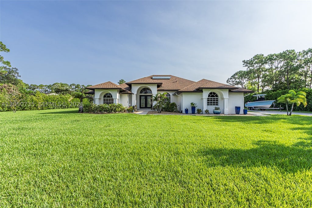 Photo of 15397 N 66th Ct N, Loxahatchee, FL 33470 (MLS # A12050735)