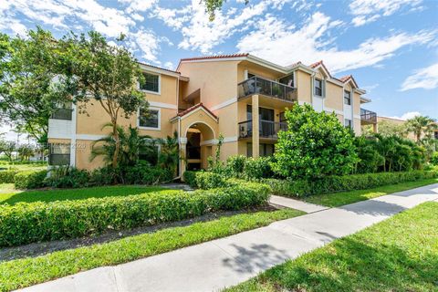 Photo of 5721 Riverside Dr #202B5, Coral Springs, FL 33067 (MLS # A12018929)