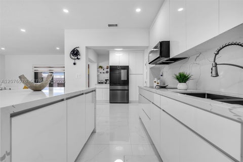 Tiny photo for 1270 W 64th Ter, Hialeah, FL 33012 (MLS # A12076578)