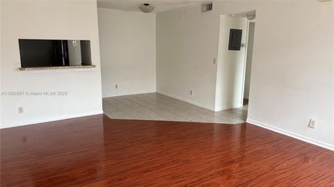 Photo of 1032 Twin Lakes Dr #21-G, Coral Springs, FL 33071 (MLS # A11852857)