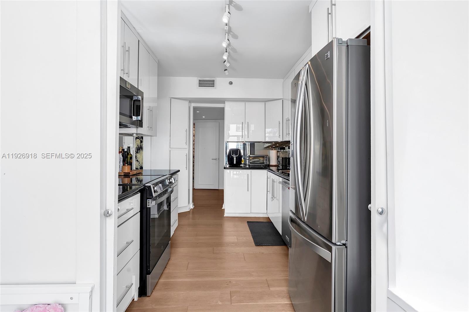 NINE ISLAND AVENUE CONDO - Residential