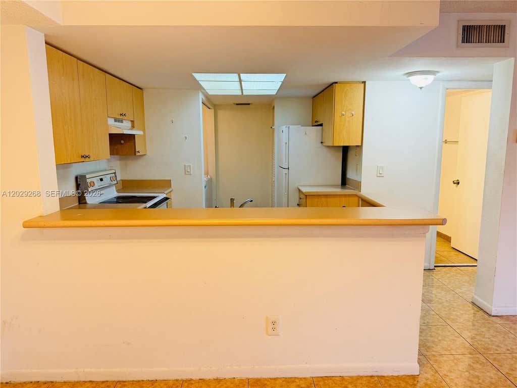 Photo of 9266 W Atlantic Blvd #1025, Coral Springs, FL 33071 (MLS # A12029268)