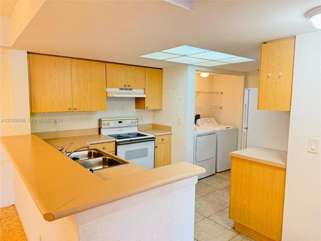 Photo of 9266 W Atlantic Blvd #1025, Coral Springs, FL 33071 (MLS # A12029268)