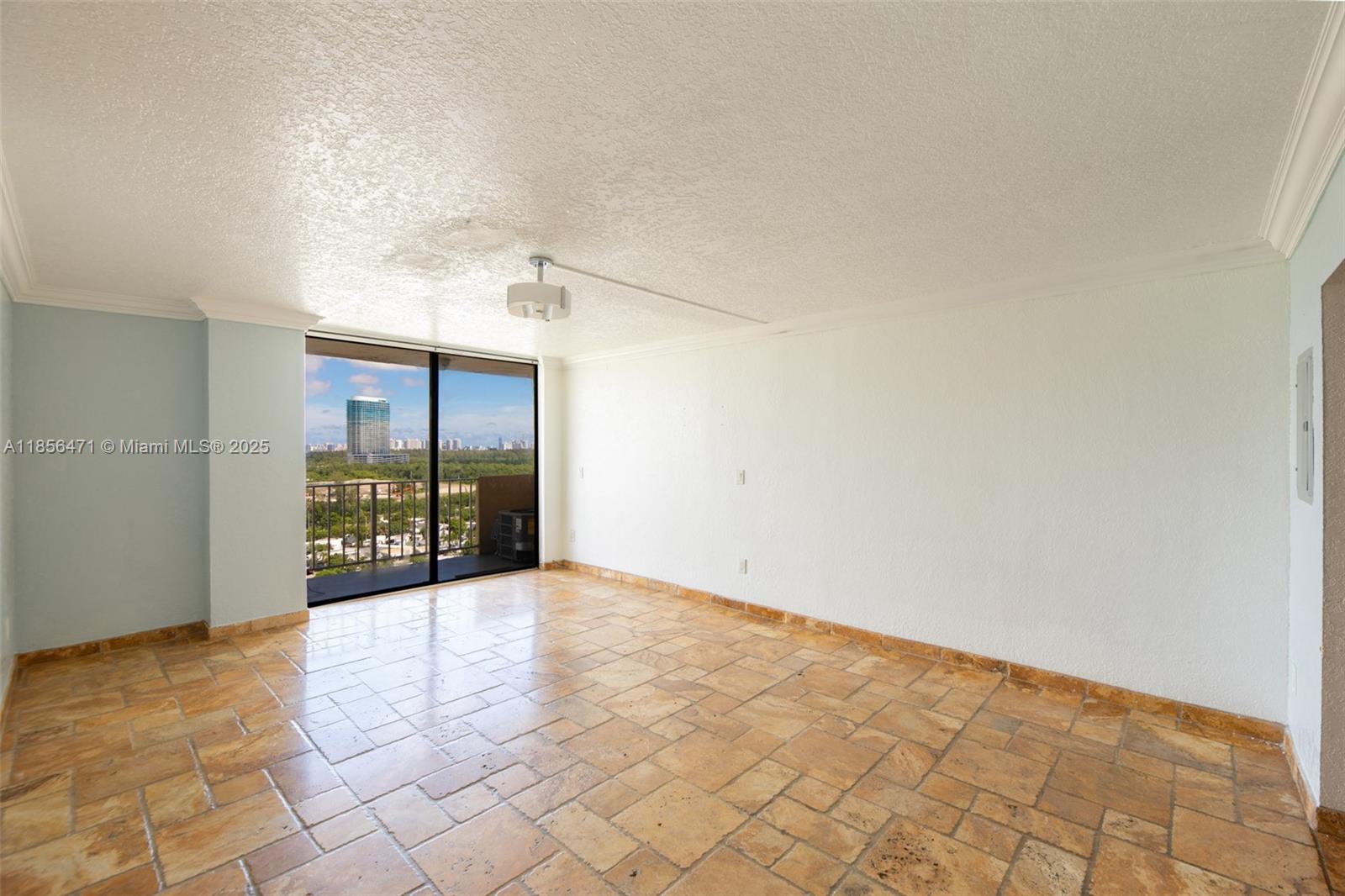 This delightful 2 BD, 2 BA unit is situated in the heart of North Miami Beach. Boutique-style high-rise building that is well-maintained. Boasts stainless steel appliances, stunning Spanish brick accents throughout, captivating views of Aventura & Miami from the 15th floor, new A/C and a partial water view. It comes with two covered parking spaces & guest parking within the building premises. The property's prime location is just across from Oleta State River Park, close to FIU North Campus, various dining options, shopping centers, and Bay Harbor within a 10-min. Drive & South Beach is a 20-minute drive. Amenities include a waterfront pool deck, which provides scenic views of luxurious homes in Keystone Point, a pool, sauna and gym.