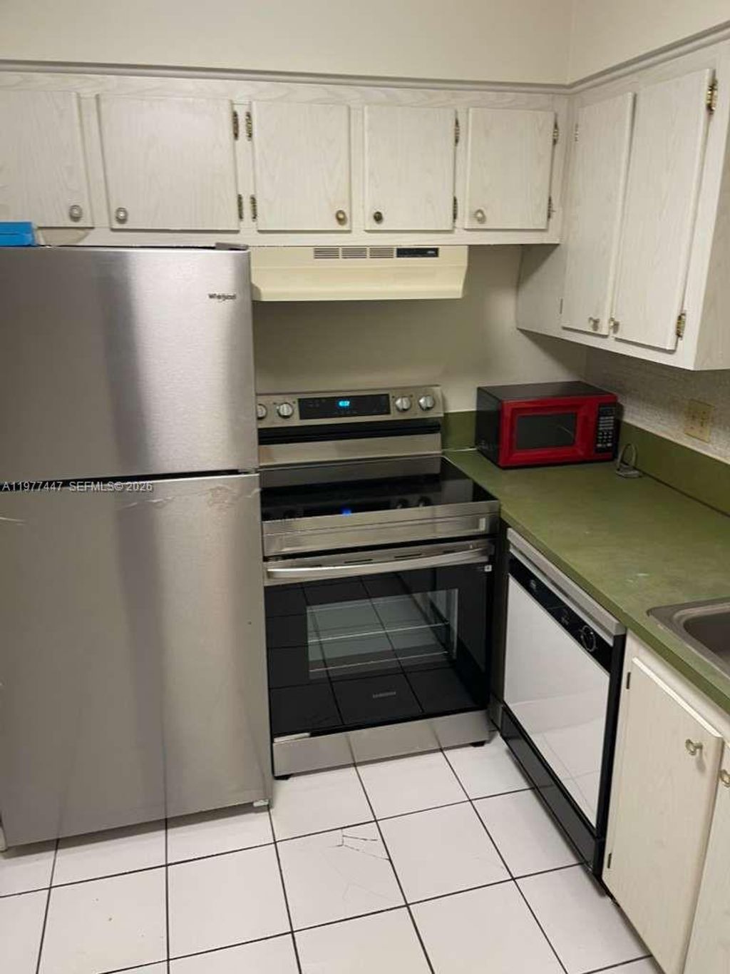 Photo of 6501 Winfield Blvd #A-24, Margate, FL 33063 (MLS # A11977447)