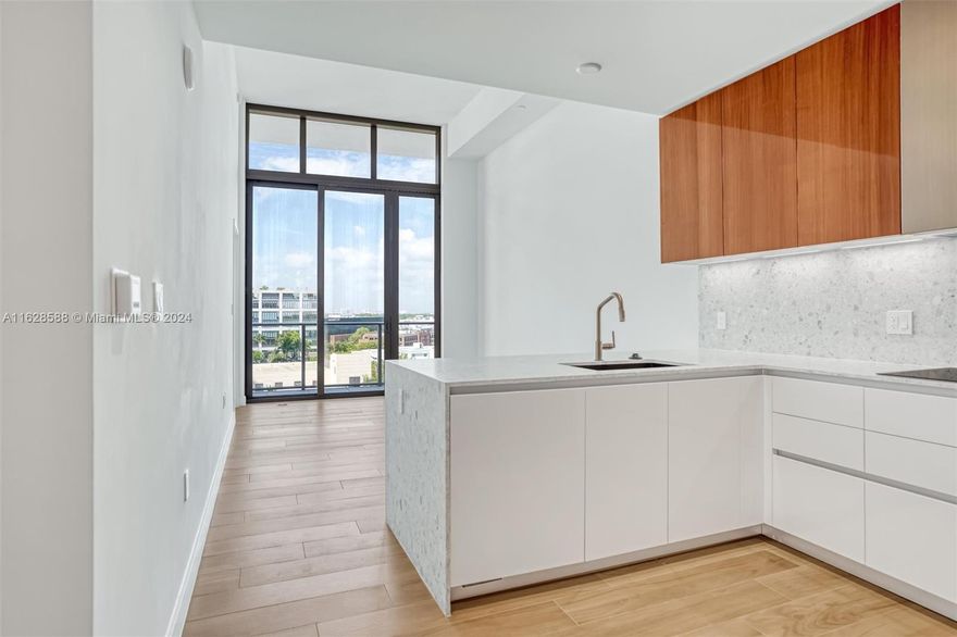 Welcome to this stunning 1 Bed 1 Bath at Mr. C Residences in Coconut Grove by Cipriani. Brand new with South-facing and Bay views, just steps from the vibrant Village of Coconut Grove. 12 ft ceilings, tons of light, and a spacious balcony. Fantastic Italian Kitchen by Italkraft, brushed brass fixtures throughout, Sub Zero appliances, custom cabinetry, and spectacular terrazzo countertop. Enjoy world-class amenities such as two pools, a state-of-the-art fitness center, Bellini Lounge on Rooftop, an on-site spa, 24-hour concierge, valet services, and Le Specialita’ branded Mr. C restaurant and gourmet market. Unit comes with Motorized Window Shades, Chandelier by Artemide and Closet Built-InsCall listing agent.