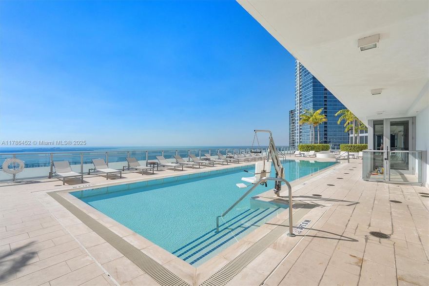 In the heart of vibrant Brickell, discover this stunning 2BD/2BA residence in the iconic BrickellHouse, crafted by Sieger Suarez. Flooded with natural light, this designer unit boasts floor-to-ceiling impact windows and a wraparound balcony. The sleek, modern kitchen features SS appliances and soft-close cupboards. The primary suite showcases a beautiful ensuite with a soaking tub and a built-out w/i closet. Enjoy luxury living with 5-star amenities: a 50-ft lap pool with water views, full spa with sauna, premier fitness center, 24/7 concierge, movie theater, summer kitchen/BBQ area, and valet, plus a robotic parking system. On-site: La Petite Maison, Osaka Nikkei, and a cozy coffee spot. Bundled service pricing available for buyers. Connect with the listing agent for details.
