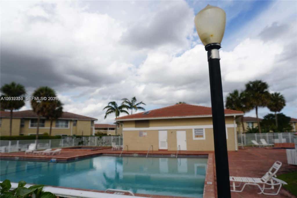 Photo of 841 Twin Lakes Dr #30-A, Coral Springs, FL 33071 (MLS # A12032719)