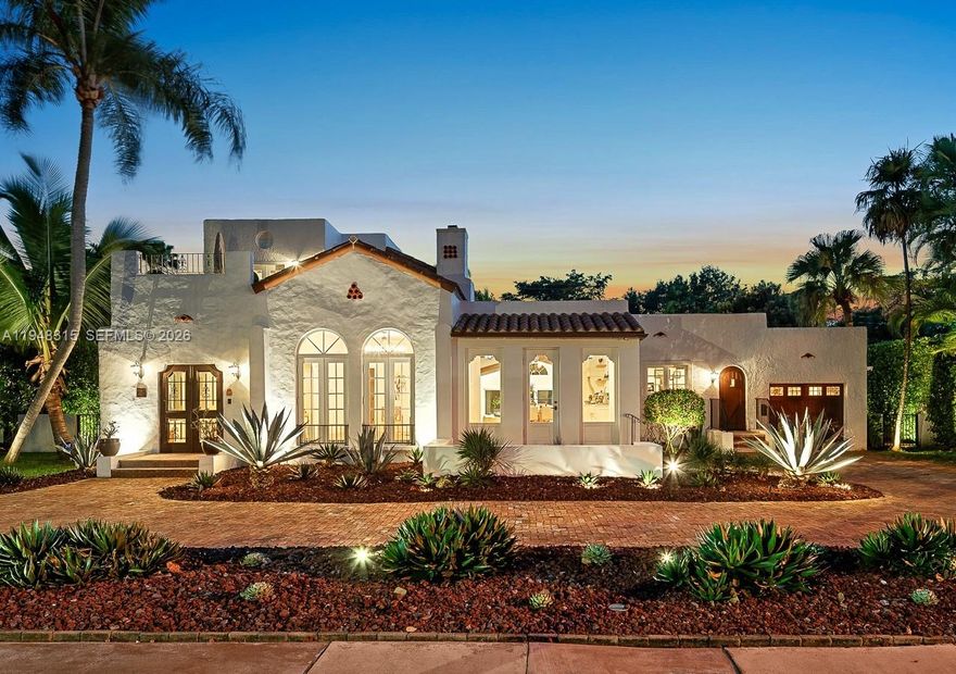 Designer-owned and completely renovated historic residence overlooking the Granada Golf Course, with awe-inspiring views of landmark banyan trees on the 6th fairway. This 4BR/3.5BA Old Spanish home seamlessly blends modern open living with preserved architectural charm, offering a rare combination of character, comfort, and move-in-ready convenience. A sun-filled, open-flow layout centers around a chef-worthy kitchen with custom Vermont-made cabinetry, Sub-Zero, Wolf & Kohler fixtures. Expansive family room opens directly to a resort-style pool & patio, ideal for indoor-outdoor entertaining. All 3 main bedrooms feature large walk-in closets. Upstairs primary suite enjoys tranquil golf course views & a charming sun porch. 4th bedroom is perfect for live-in help or in-laws. Design details include meticulously restored vintage doors, imported custom iron chandeliers, and a rare 1923 solid cast-iron soaking tub. Additional highlights include a home office with separate entrance, fully finished and air-conditioned garage currently used as a gym, commercial-grade IT with Cat 6 wiring throughout, AV, CCTV, storm windows, solid concrete block construction, and Trane central AC systems. Located outside a flood plain and adjacent to the Granada Golf Course, engineered to provide natural water absorption. A truly special Coral Gables offering—historic, refined, and turnkey—just minutes to the Biltmore Hotel, Country Club, parks, Miracle-Mile dining, and Miami International Airport.