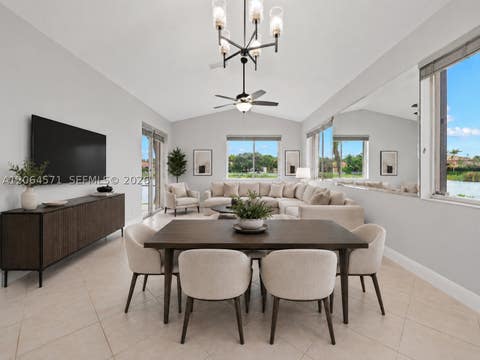 Photo of 15890 SW 12th St, Pembroke Pines, FL 33027 (MLS # A12064571)