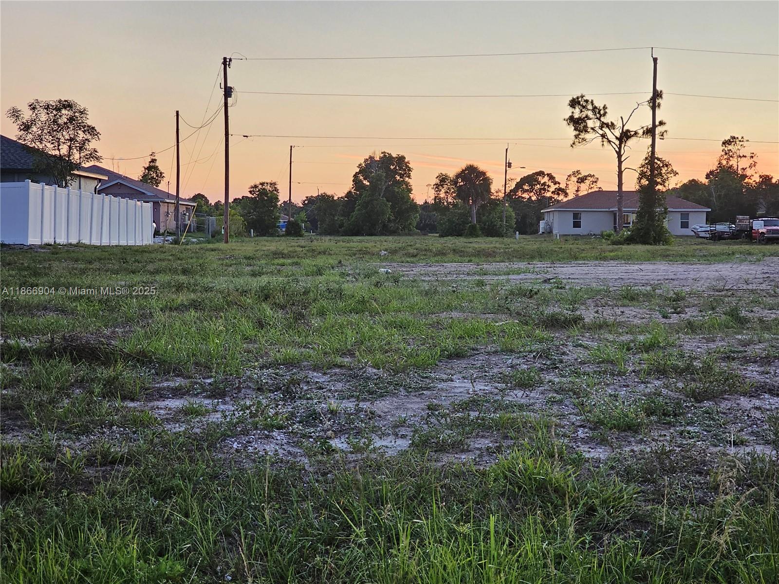 Prime investment opportunity in NW Cape Coral! This cleared, build-ready lot sits west of Burnt Store Rd in a rapidly developing area surrounded by new homes, ensuring strong long-term value and demand. Minutes to Coral Oaks Golf Course, Burnt Store Boat Ramp, Crystal Lake, and the planned Tropicana Park. Nearby, the highly anticipated Seven Islands Project promises waterfront dining, shops, hotel, and marina—driving future appreciation. Pine Island Corridor offers a variety of restaurants, retail, and services nearby. With no trees to clear and no nesting restrictions per the City, construction is seamless. Perfect for investors, builders, or out-of-state buyers seeking growth potential. SW FL awaits you-What are you waiting for?