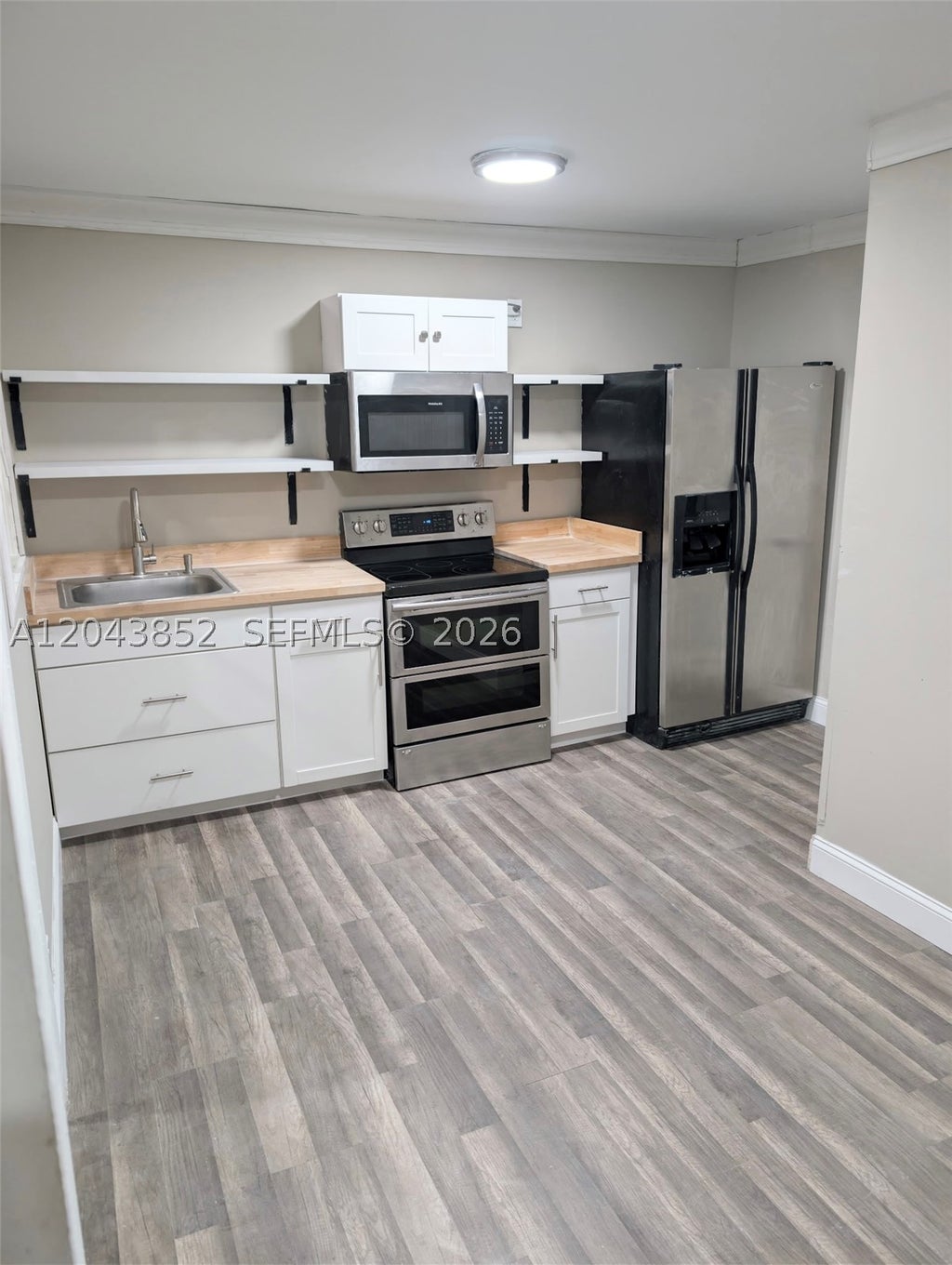Photo of 700 Boston Ave #Apt C, Fort Pierce, FL 34950 (MLS # A12043852)