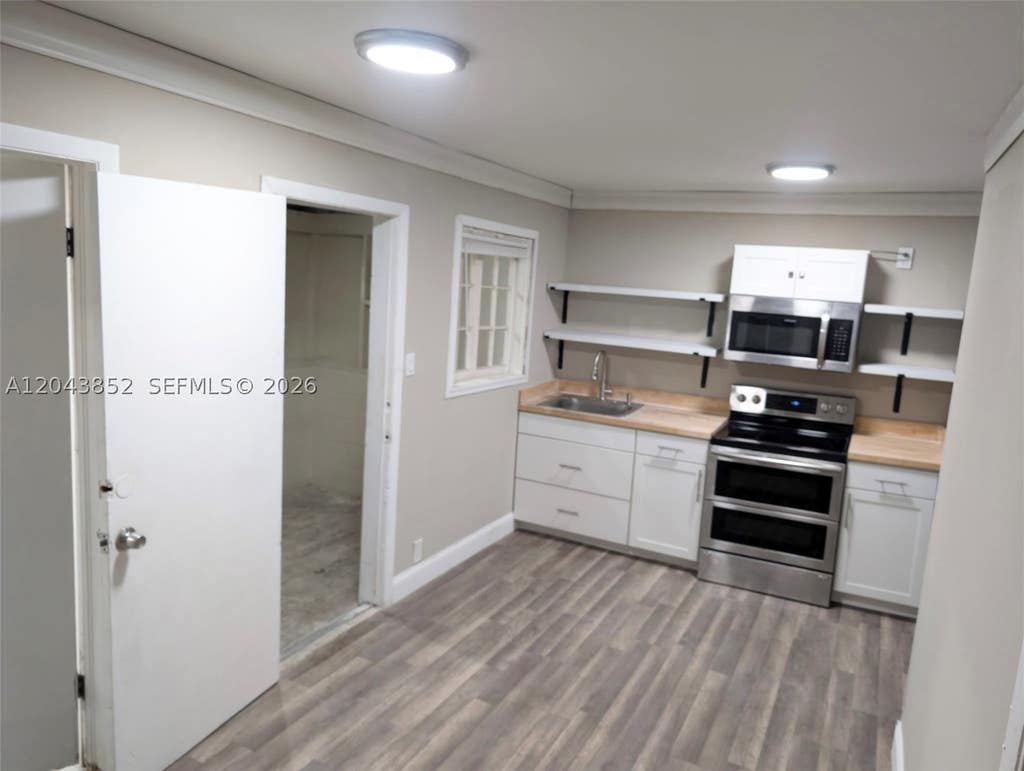 Photo of 700 Boston Ave #Apt C, Fort Pierce, FL 34950 (MLS # A12043852)