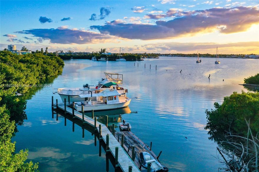 Best deal for waterfront acreage in Keys minutes to airport-private/charter.  MU Zoning allows wide range of opportunities for new owner: single family(1-4 home compound), marina, large hotel, boat dealership or more just bring your TDR's. 3 acres M.O.L. fronting US-1  & additional 3 acres of bay bottom. Included in offering: 3 resi, 1 transient & 1 com TDRs, water & sewer lines to each of the 2 upland lots installed & paid for; Marina license, open dock permit to allow immediate alteration, likely bay bottom dredge. Unique feature is strip of land +650 ft along the bay bottom may serve as access to boat slips. current dock can fit a large sportfisher & more. Seller via Don Craig & Company consultants 3211sf of commercial allowed.