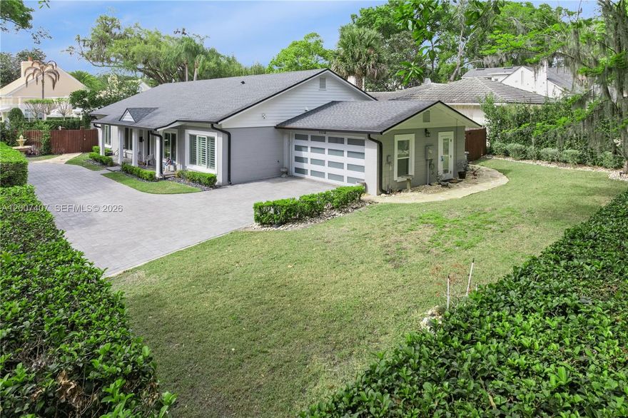 Come home to this stunning 3 Bed/3 Bath Winter Park residence, fully renovated down to the studs in 2020 and perfectly positioned on a premier corner lot at Alabama Drive and Palmer Avenue. Set among historic estate homes and the iconic tree-lined brick streets of the Chain of Lakes district, this home offers one of Winter Park’s most coveted addresses.

Enjoy an unmatched lifestyle just moments from Park Avenue’s boutiques, cafés, and acclaimed dining, the weekly farmers’ market, and the sparkling Winter Park Chain of Lakes. Kraft Azalea Gardens and the private Winter Park Racquet Club are also nearby.

Inside, the home blends timeless charm with modern refinement. The gourmet kitchen features a generous chef’s layout, premium granite, and high-end finishes. Rich hardwood floors flow throughout, complemented by upgraded Pella windows for beauty and efficiency. Major systems have been thoughtfully updated, including a tankless water heater, custom garage door, and a well-maintained roof.

Designed for true Florida living, the outdoor oasis includes an expansive screened porch with a cozy gas fireplace, ideal for year-round entertaining. The private open-air pool is surrounded by lush tropical landscaping and a fully irrigated lot, creating a serene, resort-style retreat.

Whether you seek a turnkey luxury home or a rare opportunity in Winter Park’s most prestigious zip code, this property delivers exceptional quality, location, and lifestyle.
