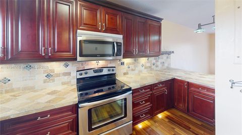 Photo of 9641 Sunrise Lakes Blvd #306, Sunrise, FL 33322 (MLS # A11879474)