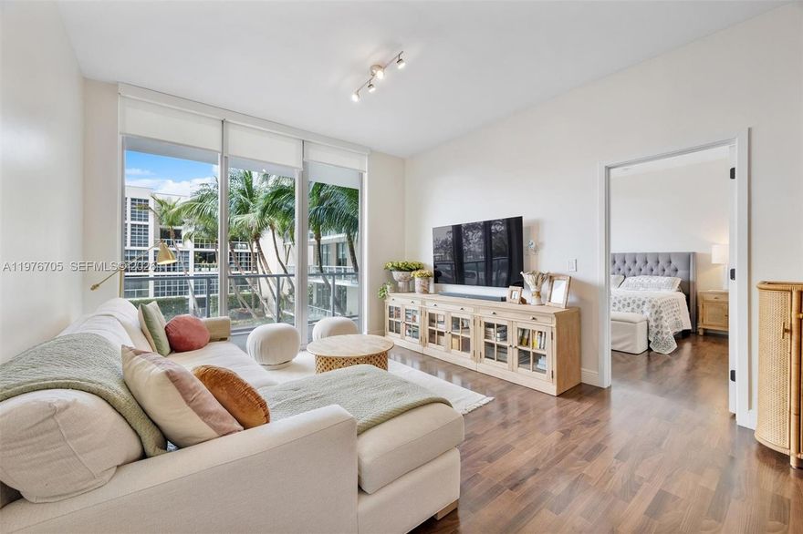 Live in the heart of Miami at Two Midtown in this beautifully updated 2-bedroom, 2.5-bath residence spanning 1,017 square feet. This thoughtfully designed layout features two primary suites, each with its own ensuite bathroom, plus a convenient half bath for guests. Recent upgrades include new flooring, fresh paint, a smart lock, and updated usb-a/usb-c electrical outlets. The kitchen is equipped with granite countertops, subway tile backsplash, and stainless steel appliances, including a new dishwasher and garbage disposal. Additional features include upgraded bathrooms, floor-to-ceiling sliding glass doors, remote-controlled blackout blinds, and a new in-unit washer and dryer. Enjoy a spacious balcony overlooking the resort-style pool with beautiful sunset views. Two Midtown offers 24/7 security, a fitness center, sauna, steam room, hot tub, and more. One assigned covered parking space included. Located just one block from Midtown’s top restaurants and retail, and minutes from the Design District and Wynwood.
