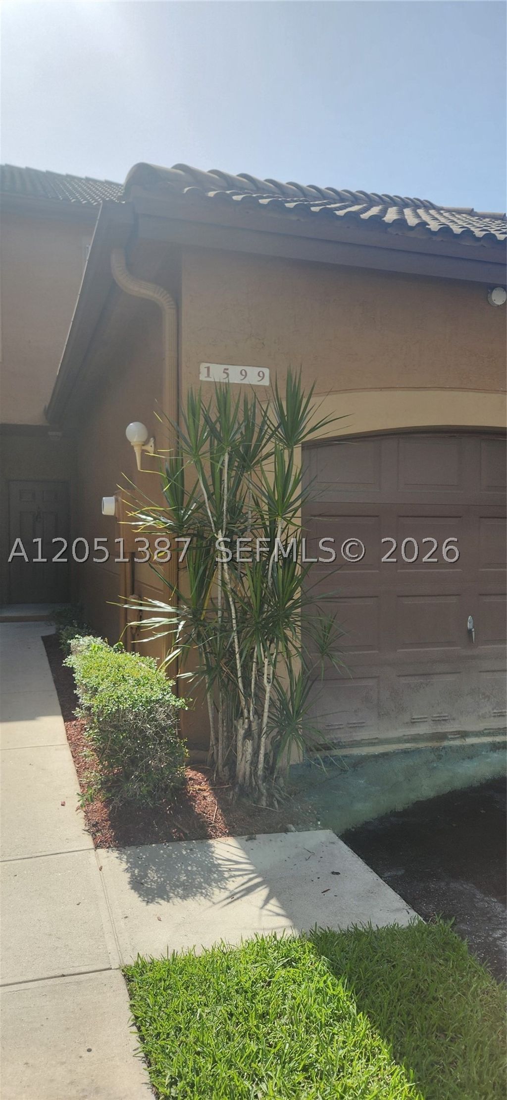 Photo of 1599 Veracruz Ln, Weston, FL 33327 (MLS # A12051387)