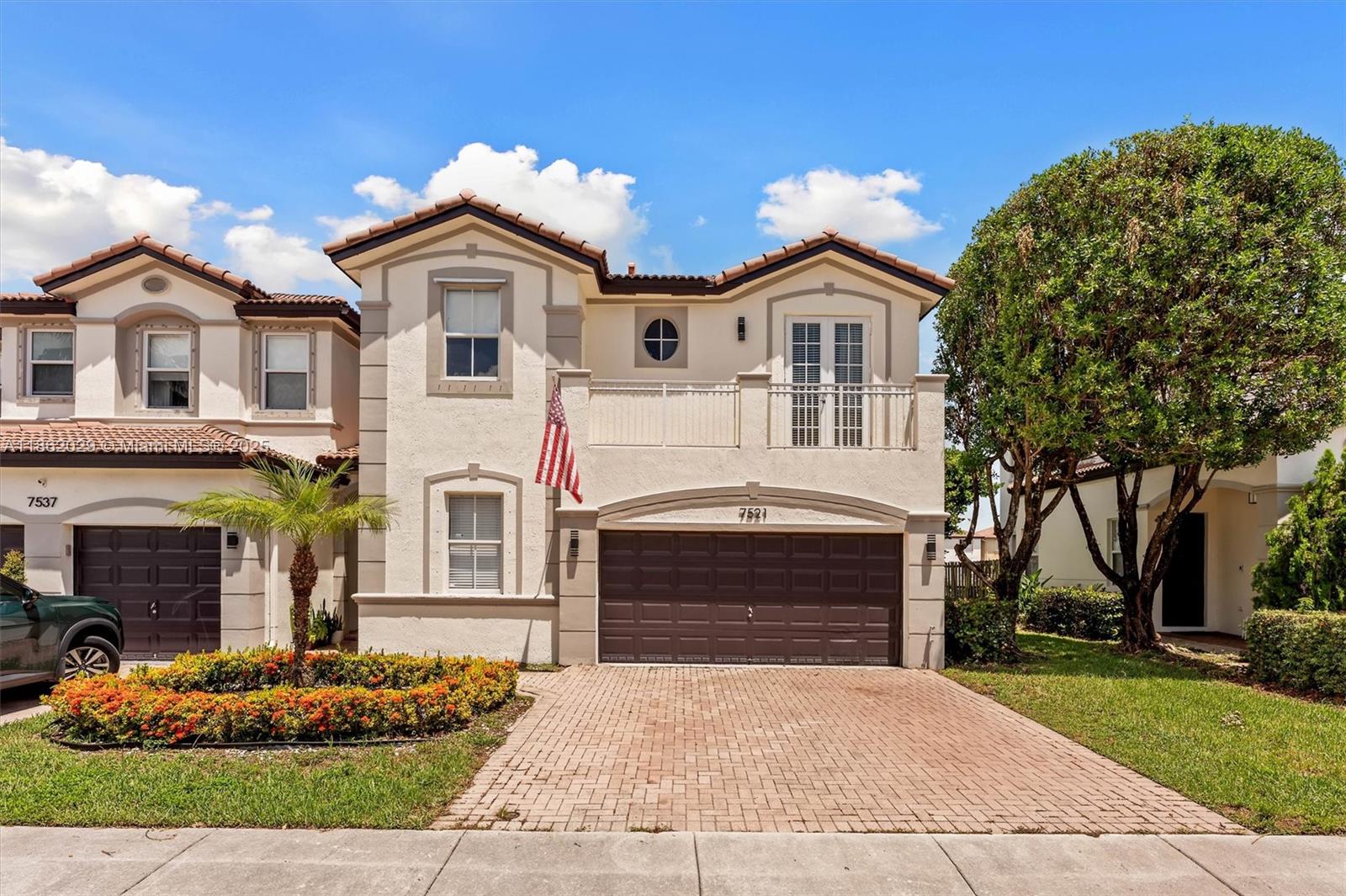 Stunning corner townhouse in the sought-after Polynesian at Islands at Doral. Featuring 5 bedrooms, 3 bathrooms (one bedroom/bath on the first floor), this modernly remodeled home boasts quartz countertops, stainless steel appliances, porcelain tile throughout, and custom closets. The 2-car garage includes a partially converted air-conditioned flex space. Enjoy a spacious updated patio and resort-style amenities: clubhouse with pools, tennis, gym, basketball, playgrounds, and more. Perfectly located near shops, dining, top schools, and major highways—luxury, versatility, and convenience in one.