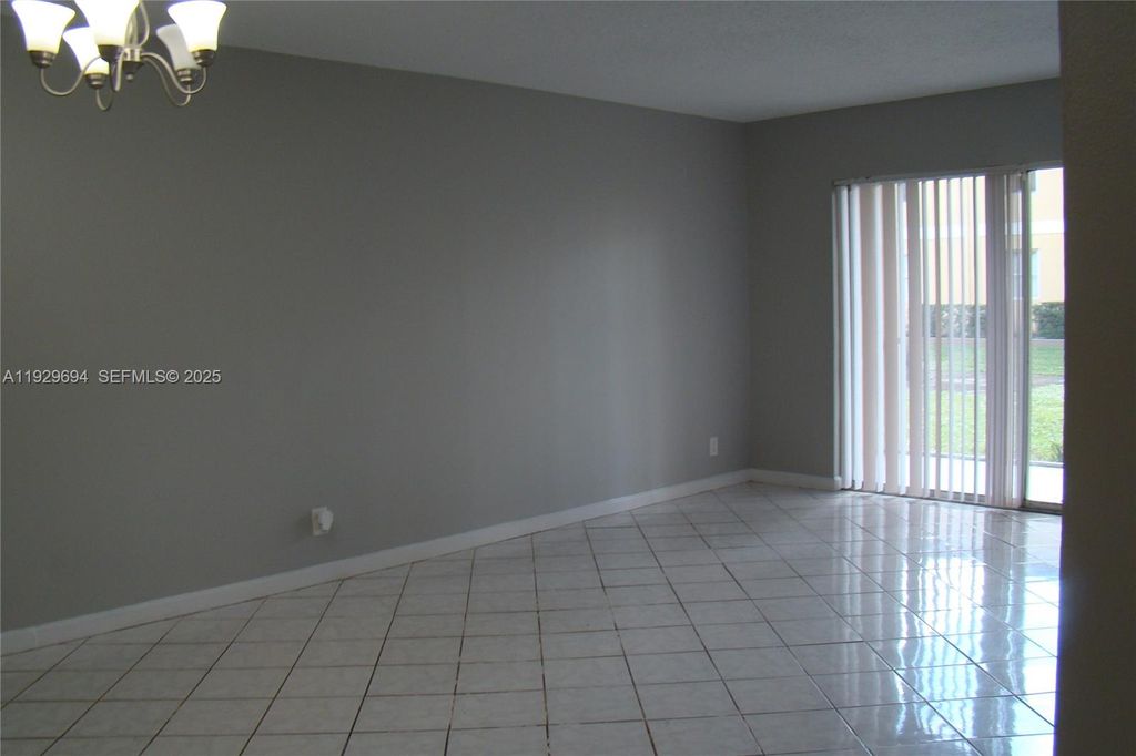 Photo of 2451 NW 56th Ave #1-106, Lauderhill, FL 33313 (MLS # A11929694)