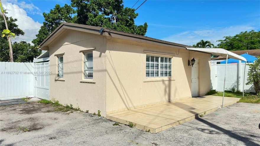 Welcome to your cozy oasis at the rear unit of 2410 Roosevelt Street in Hollywood, FL.   This charming 1-bedroom, 1-bathroom studio offers 400 square feet of comfort and privacy. Enter through the alley to find a peaceful retreat complete with a small covered backyard.
Inside, you'll love the convenience of having a washer and dryer in the unit, making laundry day a breeze. The kitchen is well-equipped with essentials, including a refrigerator, stove/range, and microwave. This pet-friendly home ensures your furry friends feel right at home too.  
easy access to highway and public transportation.