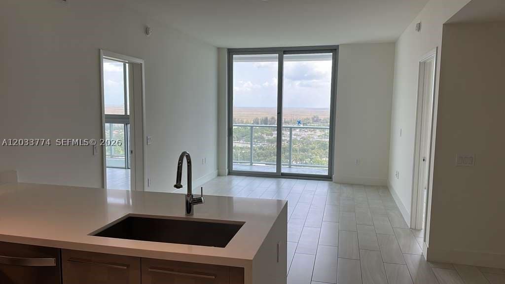 Photo of 2000 Metropica Way #2111, Sunrise, FL 33323 (MLS # A12033774)