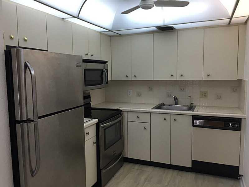 BEAUTIFUL LAKE VIEW, REMODELED 2/2 CONDO IN THE VERY DESIRABLE CENTURY VILLAGE. EXTREMELY WELL MAINTAINED. SPACIOUS WITH FUNCTIONAL LAYOUT. RESORT STYLE LIVING WITH AMPLE OF AMENITIES
