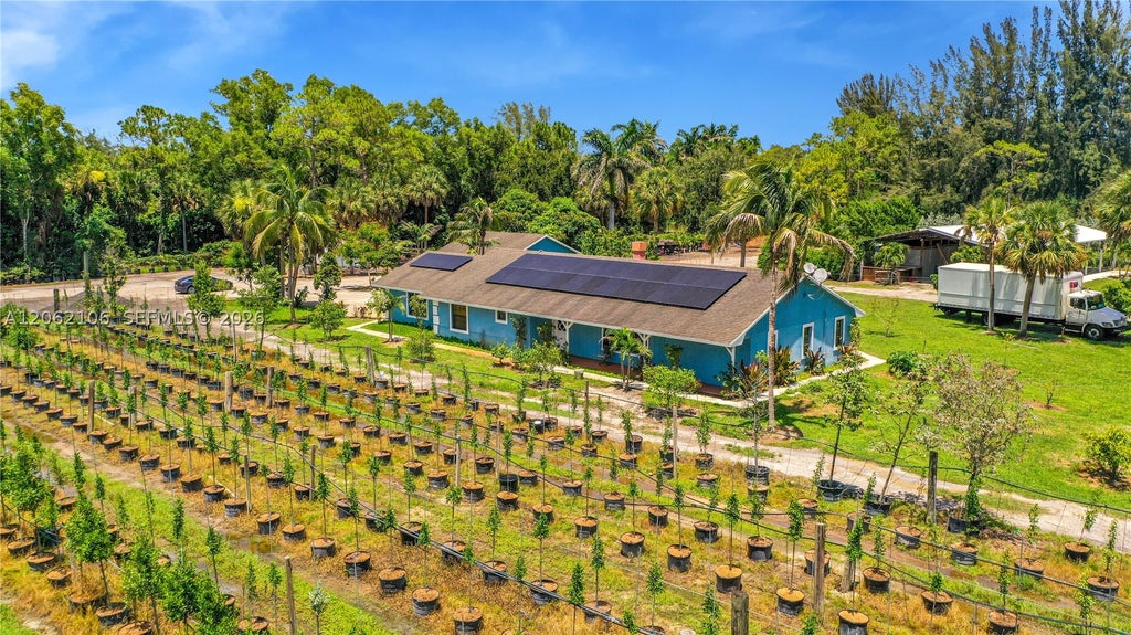Photo of 2587 E Rd, Loxahatchee, FL 33470 (MLS # A12062106)