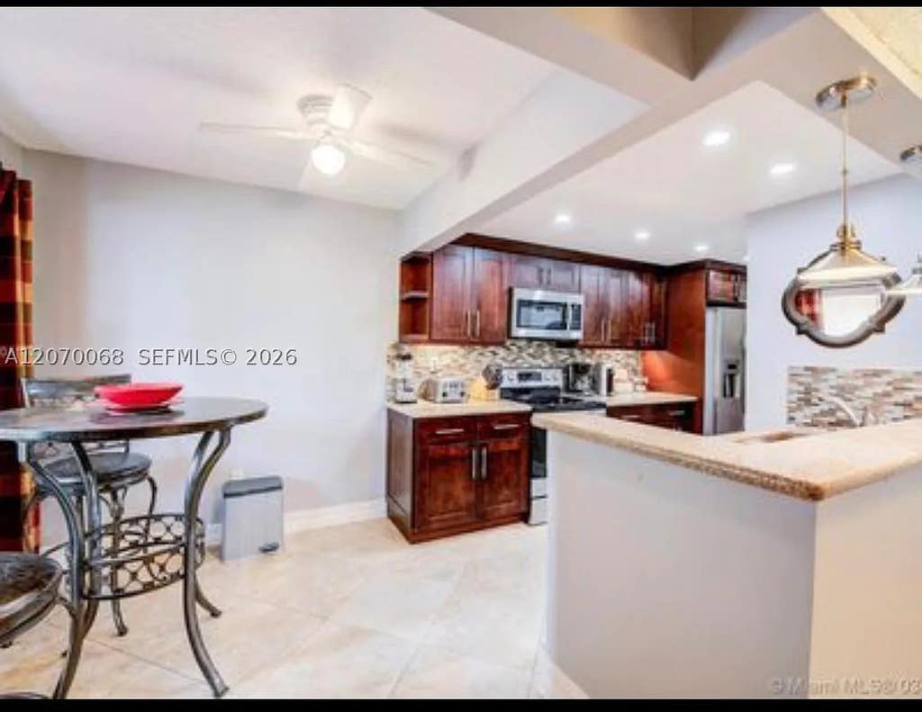 Photo of 7401 NW 16th St #108, Plantation, FL 33313 (MLS # A12070068)