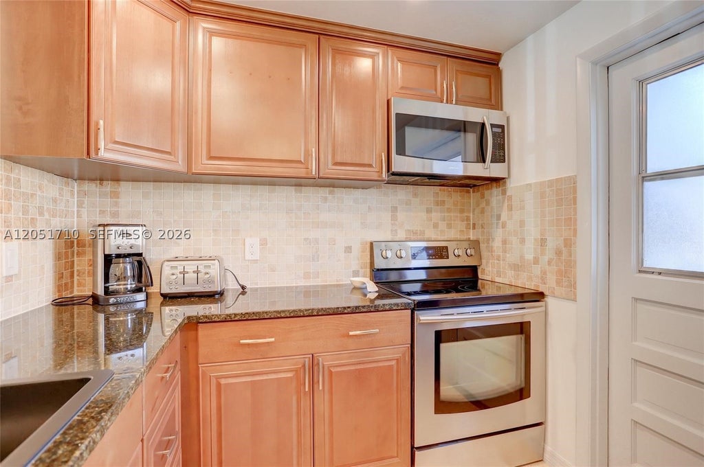 Photo of 2212 NE 1st Way #101, Boynton Beach, FL 33435 (MLS # A12051710)