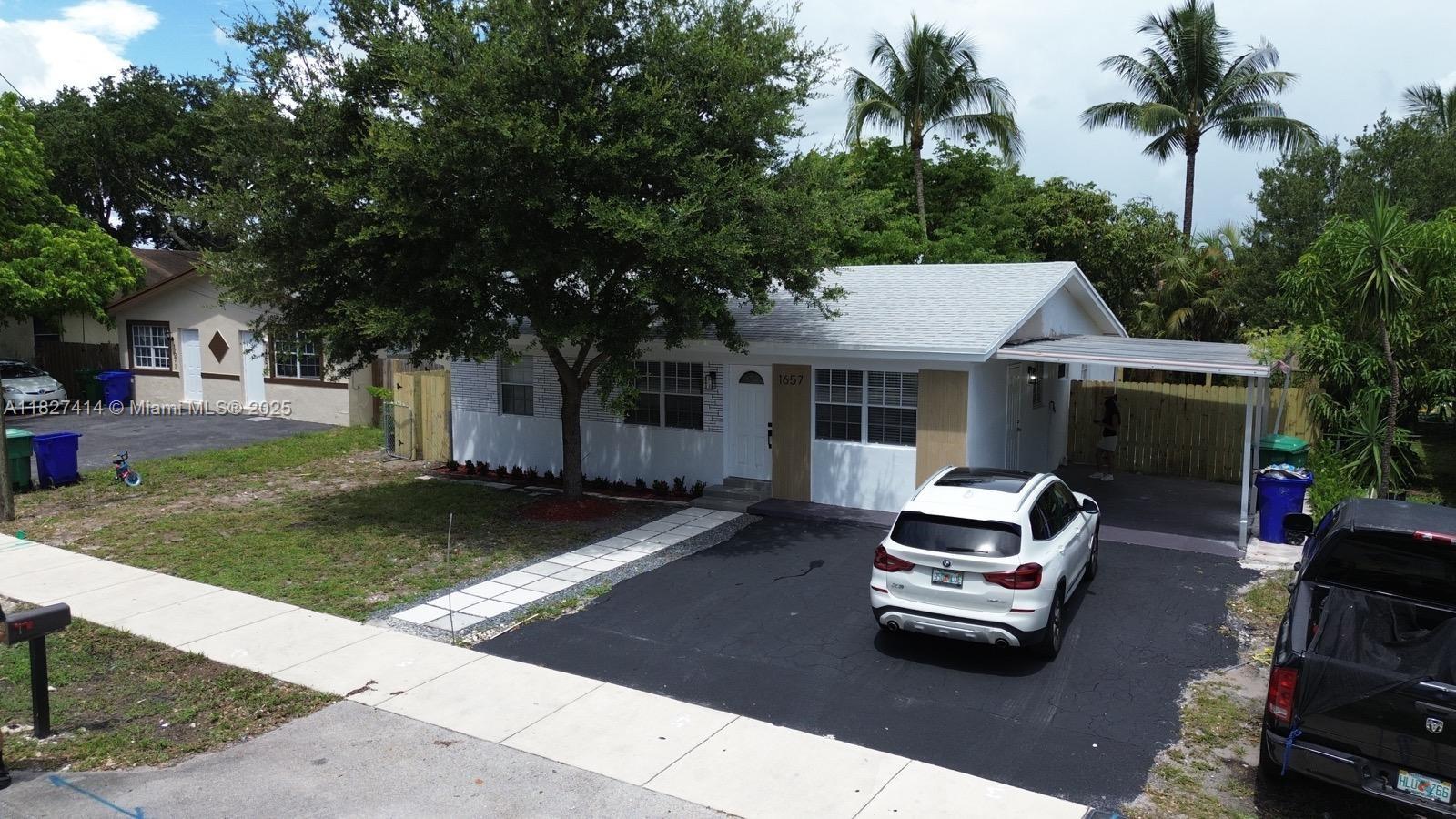 Welcome to 1657 SW 44th Ave, a beautifully remodeled single-family home located in one of Fort Lauderdale’s most family-friendly neighborhoods. This charming 3-bedroom, 2-bath home offers a perfect blend of modern updates and inviting outdoor space—ideal for families, entertaining, or simply enjoying the Florida lifestyle.
Outside, you'll fall in love with the huge backyard, shaded by gorgeous mature trees—providing both beauty and privacy. There’s plenty of room to add a pool, create a garden, or set up your dream outdoor entertaining space.
Located just minutes from major highways, shopping, dining, and top-rated schools, this home combines comfort, space, and location. Don’t miss your chance to own a move-in-ready gem in Fort Lauderdale.