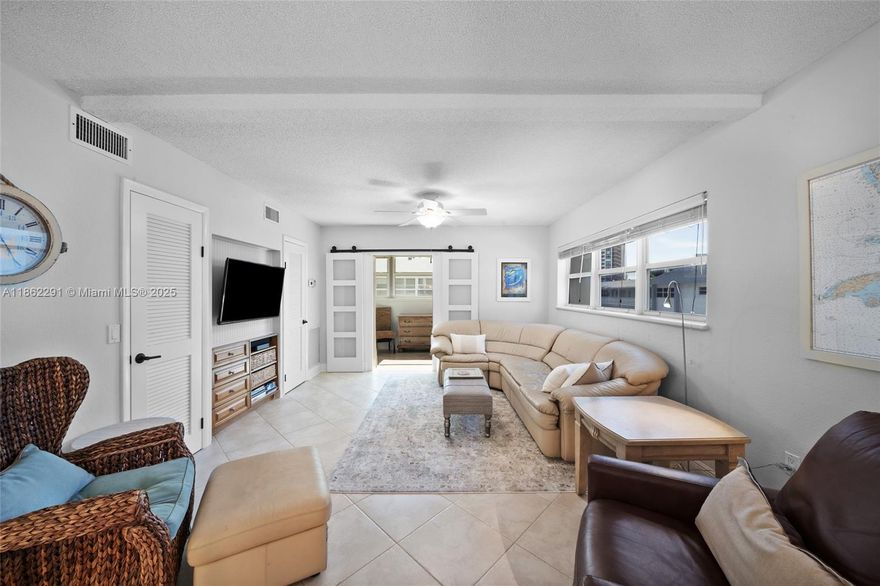 Welcome to this charming one bedroom plus additional room in the Ambassador South! Situated between the intracoastal and the ocean makes this a perfect primary home or second home. 55 or older community, forty to fifty years recently completed. Unit is very spacious with one full bedroom and sunroom which can be used as a second bedroom. Impact windows throughout, updated bathroom, updated kitchen, walk in closets, second floor unit, one parking space and a small storage area, pool area right on the intracoastal and full clubroom.