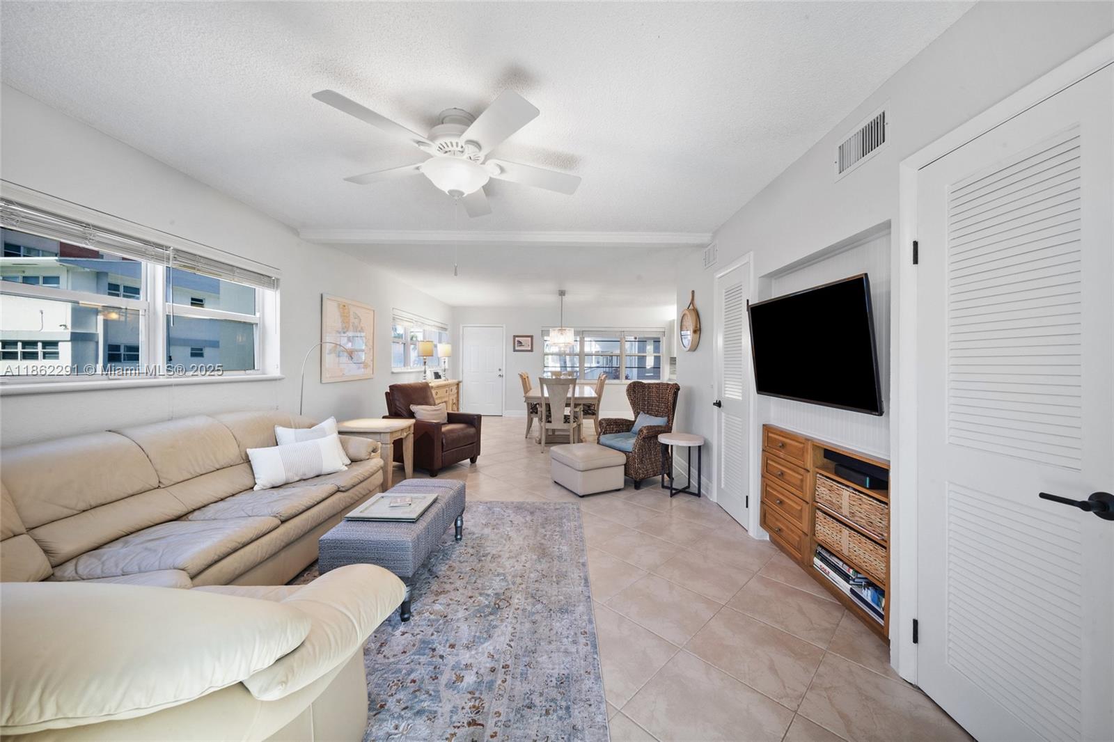 Welcome to this charming one bedroom plus additional room in the Ambassador South! Situated between the intracoastal and the ocean makes this a perfect primary home or second home. 55 or older community, forty to fifty years recently completed. Unit is very spacious with one full bedroom and sunroom which can be used as a second bedroom. Impact windows throughout, updated bathroom, updated kitchen, walk in closets, second floor unit, one parking space and a small storage area, pool area right on the intracoastal and full clubroom.