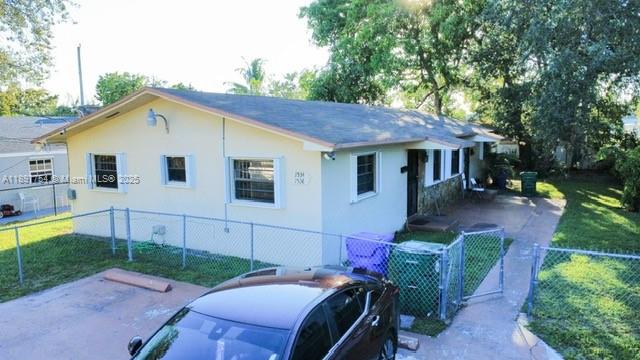 Turnkey investment opportunity! Discover a prime investment opportunity in a rapidly appreciating Miami neighborhood. This well-maintained duplex features two separate 2-bedroom, 1-bathroom units, each with its own water and electric meter. With a proven gross annual rental income of $64,800 from long-term, dependable tenants (including one Section 8 tenant), this property is a cash-flow positive asset from day one. Both units include in-unit laundry and shutters for convenience. Recent upgrades include a newer A/C unit and water heater. The expansive backyard offers potential for adding a pool or expanding the living space. Drive by to see the potential for yourself.