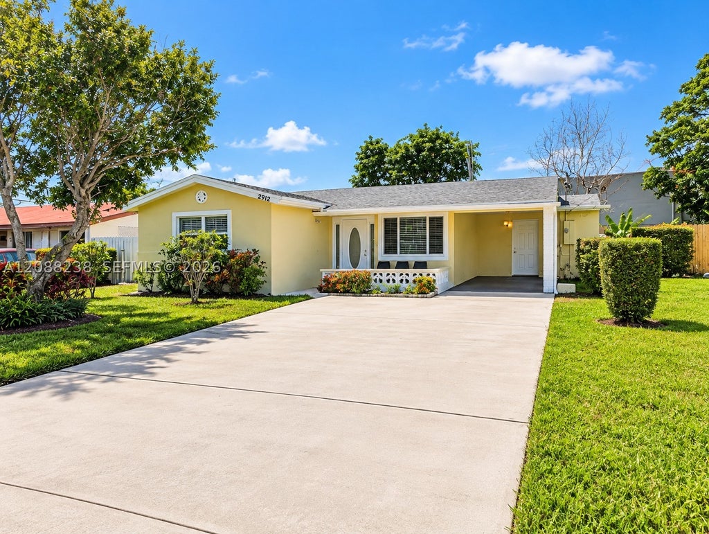 Photo of 2912 Sunshine Blvd, Miramar, FL 33023 (MLS # A12088238)