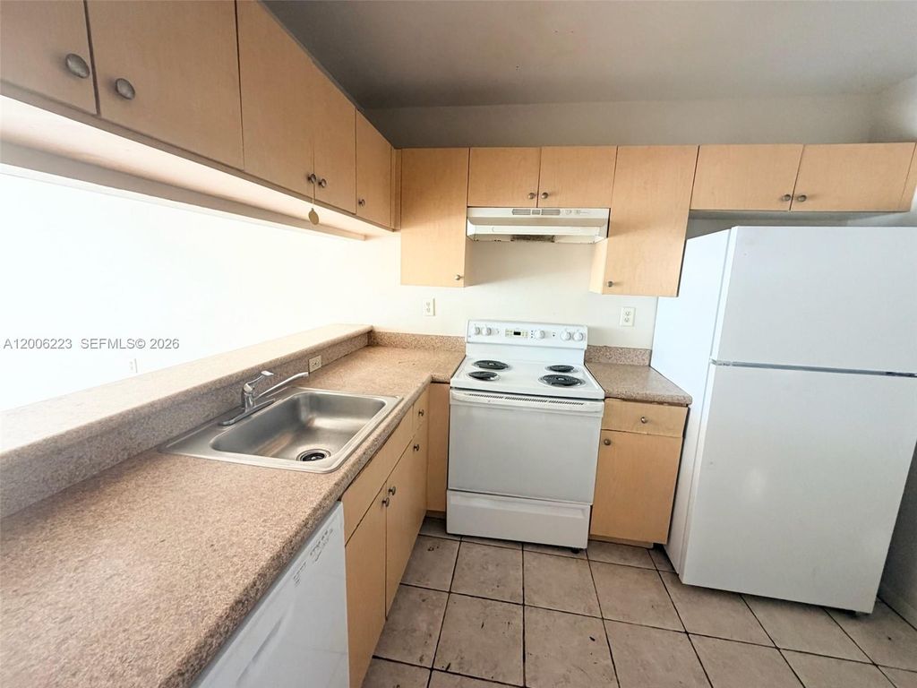 Photo of 960 Lake Victoria Dr #C, West Palm Beach, FL 33411 (MLS # A12006223)