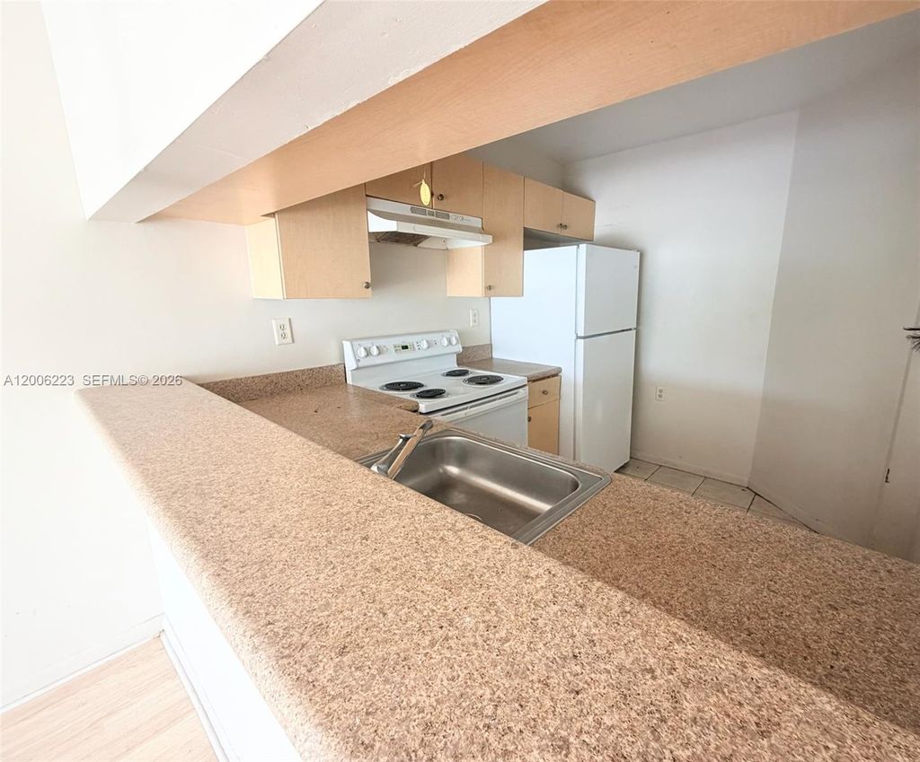 Photo of 960 Lake Victoria Dr #C, West Palm Beach, FL 33411 (MLS # A12006223)