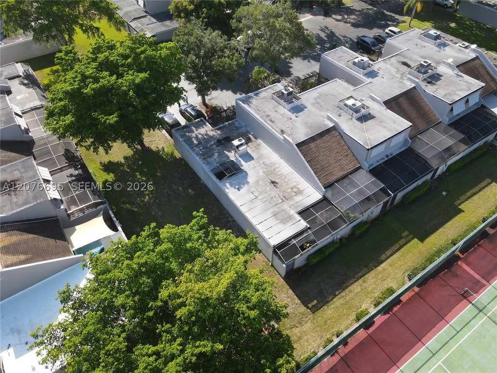 Photo of 1541 NW 113th Ave, Pembroke Pines, FL 33026 (MLS # A12076695)