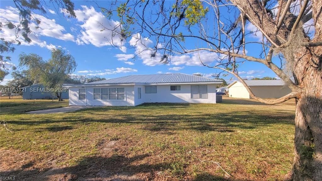 Photo of 4008 Rye Ct, La Belle, FL 33935 (MLS # A11953121)