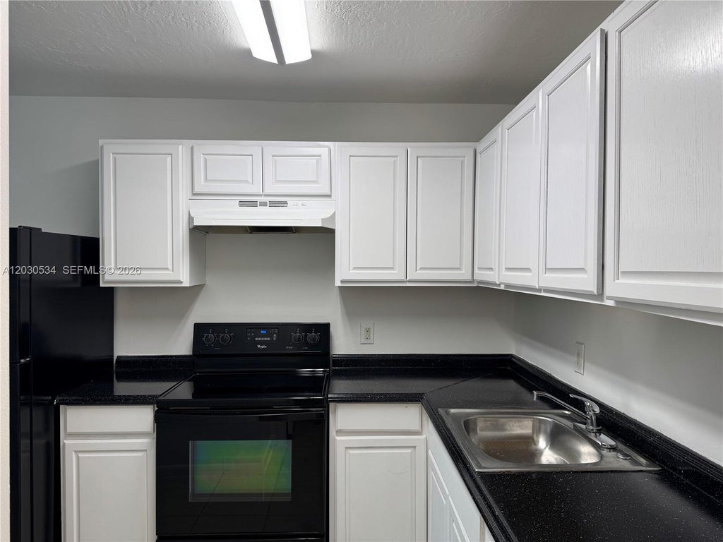 Photo of 1200 NW 9th St #A, Fort Lauderdale, FL 33311 (MLS # A12030534)