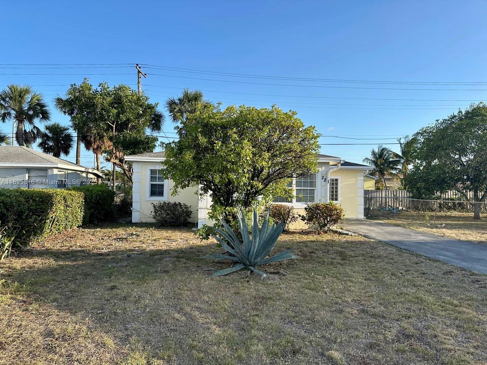 This unique single-family home offers the perfect blend of convenience and charm. Featuring a sturdy CBS construction, the single-level floor plan includes 2 full size bedrooms, an additional versatile room for a den or third bedroom, and plenty of living space. The property boasts a large front yard and no HOA. Ideally located just minutes from the beach, parks, shopping, and within walking distance to the Municipal Complex and Utilities District, it’s perfect for those seeking accessibility and comfort.