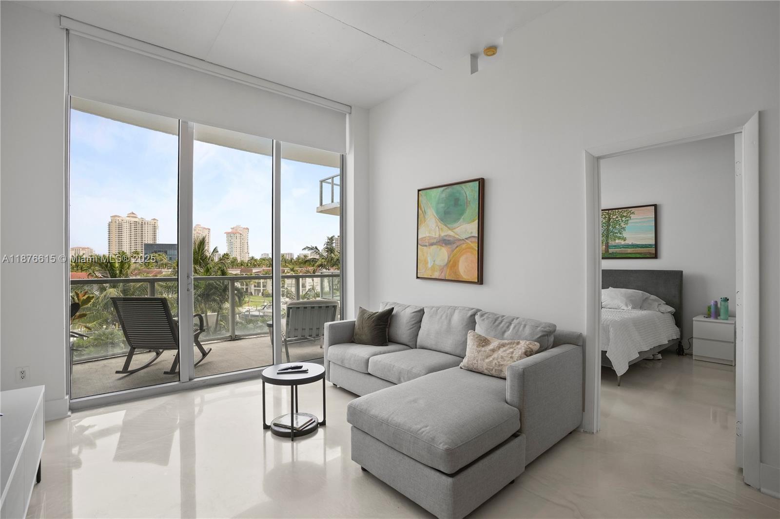 Beautifully renovated 3-bedroom, 2-bath loft-style apartment with high ceilings and marble floors throughout. Modern kitchen features granite countertops and stainless steel appliances. Both bathrooms are tastefully updated with high-end finishes. Spacious layout with an open-concept design, offering flexibility and comfort. Located in a smart, high-tech building with top-tier amenities including 24-hour valet, concierge service, resort-style pool, and a fully equipped gym. Prime location close to Aventura Mall, top-rated restaurants, hospitals, and more. Enjoy a modern lifestyle in the heart of the city – a must-see