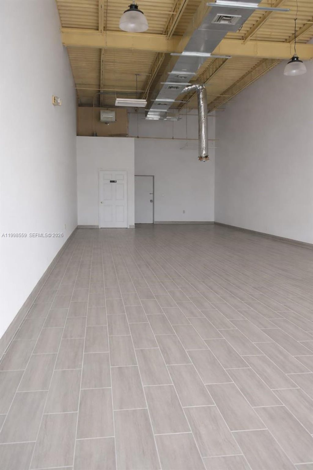 Photo of 5365 N State Road 7, Tamarac, FL 33319 (MLS # A11998559)