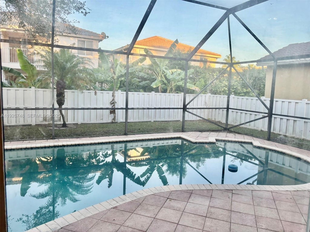 Photo of 12425 NW 54th Ct, Coral Springs, FL 33076 (MLS # A11926748)