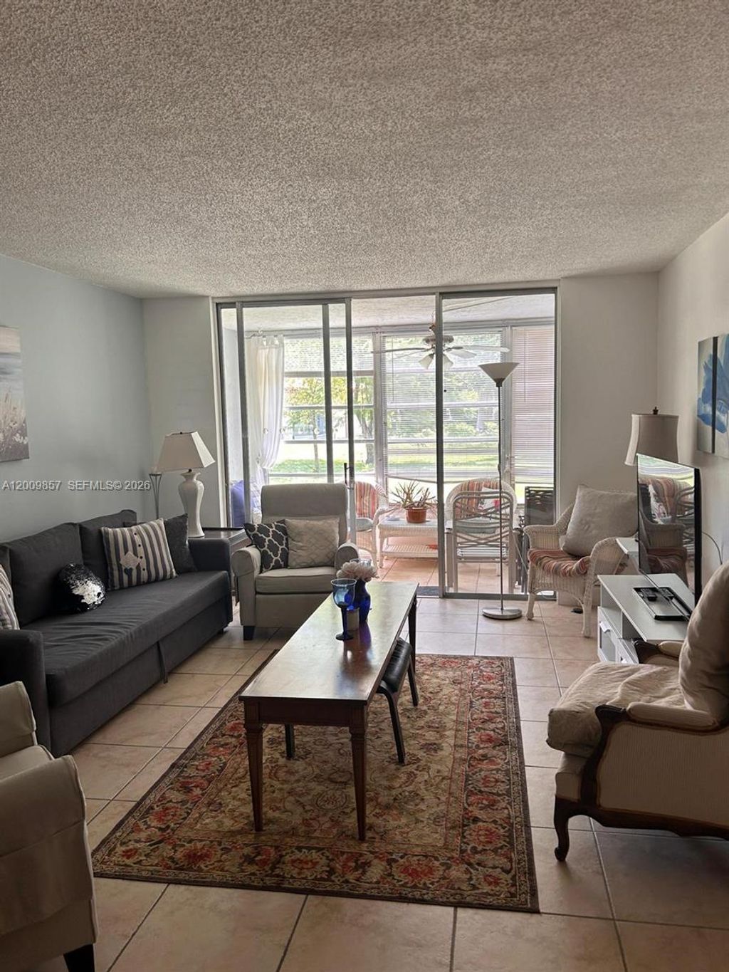 Photo of 3099 NW 48th Ave #153, Lauderdale Lakes, FL 33313 (MLS # A12009857)