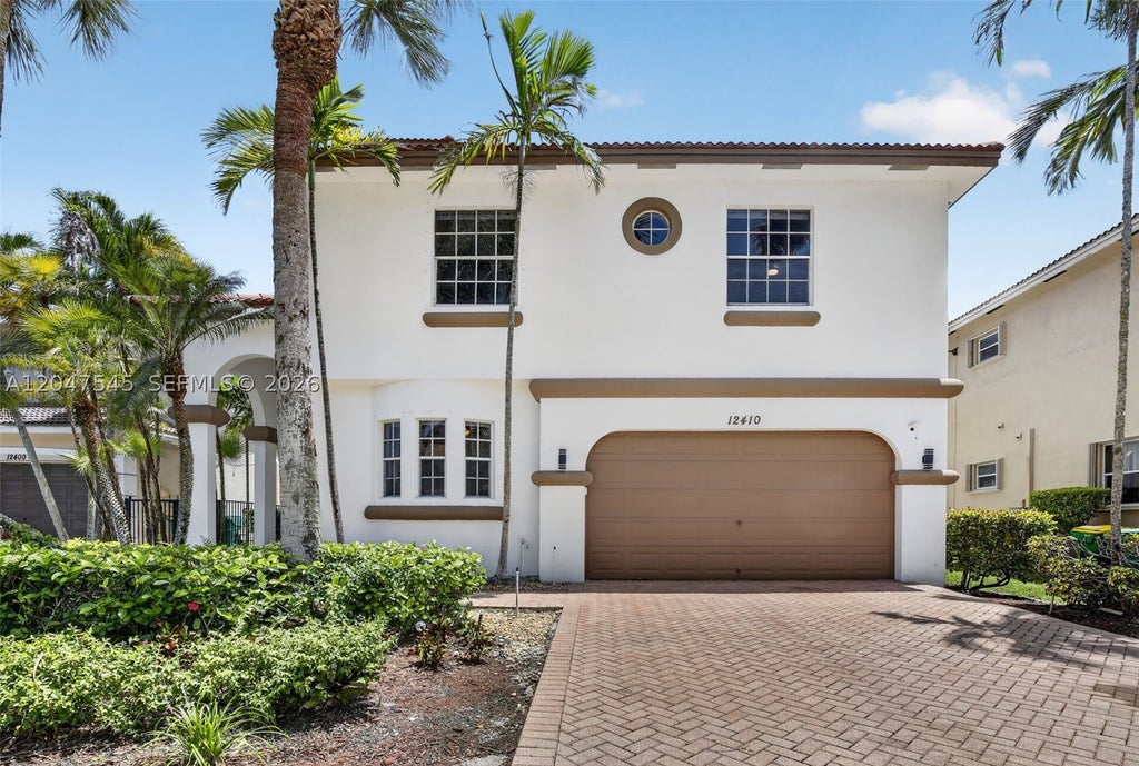 Photo of 12410 SW 1st St, Plantation, FL 33325 (MLS # A12047545)