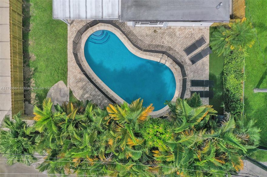 Fall in love with this charming 3-bedroom, 2-bath Hollywood home featuring an extra flex space perfect for a home office/ ideal for todays live/work lifestyle. The kitchen showcases beautiful, brand-new appliances and opens to bright, inviting living areas. Step outside to a lush, fully NEW fenced backyard with a sparkling freeform pool and a brand-new child safety fence. Unbeatable location minutes to the beach, Hollywood Broadwalk, restaurants, shopping, Hollywood Circle, major highways, and Fort Lauderdale-Hollywood International Airport. Your private oasis in the heart of South Florida