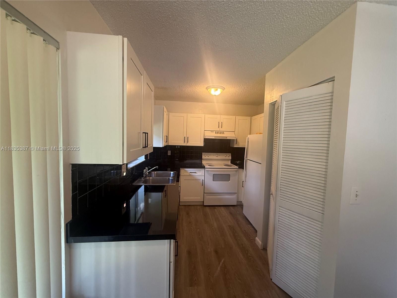 BANYAN COURTS CONDO - Residential Lease