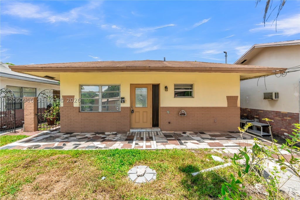 Photo of 5742 Garfield St #2, Hollywood, FL 33021 (MLS # A12060906)