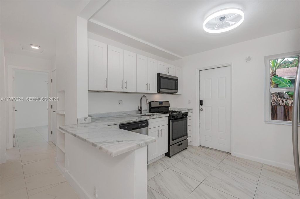 Photo of 1914 Dewey St #B, Hollywood, FL 33020 (MLS # A11979228)